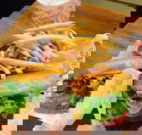 Betty's Burgers  Concrete Co. - Broadbeach - Food Delivery Shop