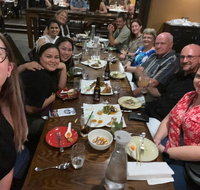 Small-Group Walking Food Tour in Darwin City with Dinner - Food Delivery Shop